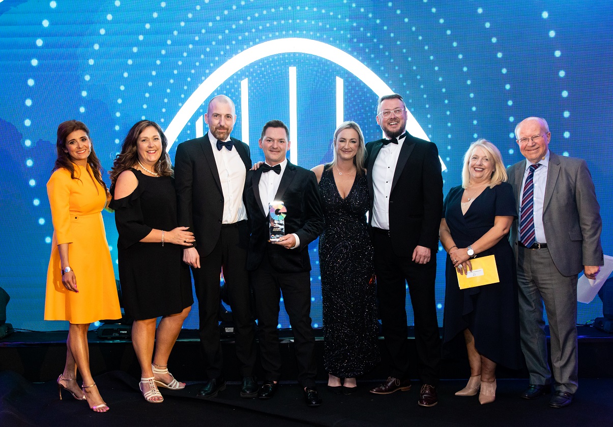 The HE Team Receiving Their Award At Educate North